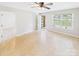 Sunny living room with tile floors, ceiling fan, a view of the front yard, and neutral paint at 2541 26Th Ne Ave, Hickory, NC 28601
