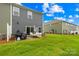 Cozy backyard space with patio, grill, and seating, ideal for outdoor enjoyment at 2717 Aubrey St, Monroe, NC 28110