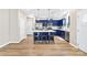 Contemporary kitchen with bright lighting, a center island, modern appliances and blue cabinetry at 2717 Aubrey St, Monroe, NC 28110