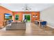 Inviting living room featuring wood floors, a comfortable sofa, and access to a patio at 2717 Aubrey St, Monroe, NC 28110