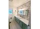 Bathroom with floral wallpaper, a modern sink, and a mirror at 3115 Falling Creek Rd, Hickory, NC 28601