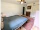 Bedroom with ceiling fan, area rug, closet and painted walls at 3115 Falling Creek Rd, Hickory, NC 28601