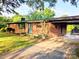 All brick home with covered front entry and carport offering a welcoming approach at 3115 Falling Creek Rd, Hickory, NC 28601