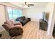 Inviting living room with cozy furniture and large windows offering plenty of natural light at 3115 Falling Creek Rd, Hickory, NC 28601