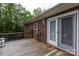 Backyard deck with sliding glass door and a welcome mat at 328 Burrage Ne Rd, Concord, NC 28025