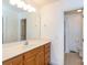 Bathroom with a vanity, large mirror, and tile floors at 328 Burrage Ne Rd, Concord, NC 28025