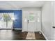 Bright entryway featuring a front door with sidelights and views of the living room at 336 Oakwood Dr, Mount Holly, NC 28120