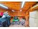 Organized garage space with workbench, pegboard, storage cabinets and equipment at 336 Oakwood Dr, Mount Holly, NC 28120