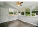 Bright sun room with many windows and hardwood floors at 336 Oakwood Dr, Mount Holly, NC 28120