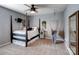 Cozy bedroom featuring a four-poster bed, a hanging chair, and soft lighting at 417 Livingston Dr, Lancaster, SC 29720