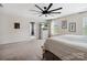 Cozy bedroom showcasing plush carpeting, modern decor, and natural light at 417 Livingston Dr, Lancaster, SC 29720
