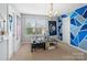 Bright bedroom with ample natural light, showcasing a collection of toys on a table and patriotic decor at 417 Livingston Dr, Lancaster, SC 29720