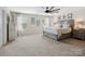Primary bedroom featuring a large bed, windows, and a neutral color palette at 417 Livingston Dr, Lancaster, SC 29720