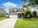 Beautiful two-story home with a well-maintained lawn and appealing curb appeal at 417 Livingston Dr, Lancaster, SC 29720