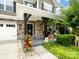 Inviting front porch with decorative plants and welcoming details at 417 Livingston Dr, Lancaster, SC 29720