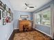 Well-lit home office with a classic wooden desk and a patterned rug at 417 Livingston Dr, Lancaster, SC 29720