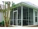 Enclosed porch offers a cozy, bright space with multiple windows for natural light and comfortable outdoor living at 4492 Antelope Ln, Charlotte, NC 28269