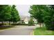 Scenic street view of well-maintained homes, lush trees, and sidewalks, creating a welcoming neighborhood ambiance at 4492 Antelope Ln, Charlotte, NC 28269