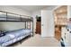 Spare bedroom with neutral carpet, bunk beds, dresser and adjoins to the hall at 4511 Hunton Dale Nw Rd, Concord, NC 28027
