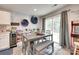Charming dining area with decorative wall accents and plenty of natural light at 4511 Hunton Dale Nw Rd, Concord, NC 28027