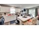Open kitchen with island and modern appliances flowing to dining area at 4511 Hunton Dale Nw Rd, Concord, NC 28027