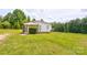 Charming single-story home with a well-maintained lawn, mature trees, and inviting front porch at 4630 Irish Potato Rd, Kannapolis, NC 28083