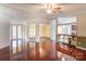 Spacious living room featuring hardwood floors and an open layout with easy access to other living spaces at 4630 Irish Potato Rd, Kannapolis, NC 28083