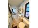 Cozy bathroom with a large window and a view to the yard at 5022 Wrenn Dr, Denver, NC 28037