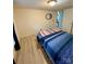 Bedroom with wood floors and bright sunlight at 5022 Wrenn Dr, Denver, NC 28037