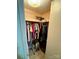 Organized walk-in closet with shelves and hanging space at 5022 Wrenn Dr, Denver, NC 28037