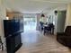 Open dining area with sliding glass doors to the outdoor patio at 5022 Wrenn Dr, Denver, NC 28037