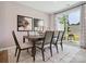 A dining room with decor, table, chairs and sliding glass doors to outdoor patio at 507 Webster Ln, Cramerton, NC 28032