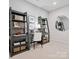 Home office with custom built-in shelving and sleek modern design at 507 Webster Ln, Cramerton, NC 28032