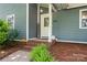 Charming front porch with welcome sign and decorative details at 6313 Weddington Rd, Concord, NC 28027