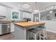 Kitchen featuring white cabinets, granite countertops, and stainless steel dishwasher at 6313 Weddington Rd, Concord, NC 28027