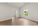 Bright, spacious bedroom featuring hard wood floors and ample natural light at 7217 Jerimoth Dr, Charlotte, NC 28215
