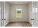 Cozy office space with hardwood floors, a window view, and natural light at 7217 Jerimoth Dr, Charlotte, NC 28215