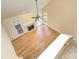 Elevated view of a living room featuring a fireplace and hardwood floors at 8044 Hawk Crest Ct, Charlotte, NC 28270