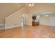 View of the open-concept living area with hardwood floors and lots of natural light at 8044 Hawk Crest Ct, Charlotte, NC 28270