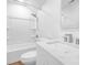 Bright bathroom featuring a shower, toilet, and vanity with modern fixtures at 10101 Wood Ct, Charlotte, NC 28277