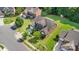 Aerial view of the property showcasing its well-maintained lawn, mature trees, and proximity to neighboring homes at 10106 Silverling Dr, Waxhaw, NC 28173