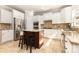 Beautiful kitchen with an island, stainless steel appliances, and tile flooring at 10106 Silverling Dr, Waxhaw, NC 28173