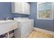 Functional laundry room with ample storage and natural light at 10106 Silverling Dr, Waxhaw, NC 28173