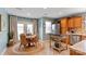 Eat-in kitchen with stainless steel appliances and natural wood cabinets at 1013 Nez Perce Ln, Monroe, NC 28110