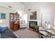 Comfortable living room with a fireplace, a large rug, and inviting armchairs at 1013 Nez Perce Ln, Monroe, NC 28110