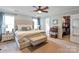 Spacious main bedroom featuring a walk-in closet, natural light, and an ensuite bathroom at 1013 Nez Perce Ln, Monroe, NC 28110