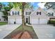 Charming townhome featuring an attached garage and welcoming front entrance at 10135 Blakeney Preserve Dr, Charlotte, NC 28277