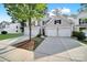 Beautiful home with a two-car garage and a well-maintained front yard at 10135 Blakeney Preserve Dr, Charlotte, NC 28277