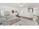 Open floor plan featuring a large living room area with wood floors at 10135 Blakeney Preserve Dr, Charlotte, NC 28277