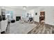 Bright living room features a fireplace, plush rug, and stylish decor at 10135 Blakeney Preserve Dr, Charlotte, NC 28277